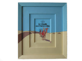 Encadrement Tintin. Le sujet est prolongé par des papiers sur un double passe-partout.