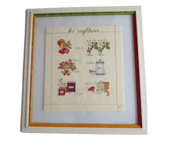 Encadrement broderie. entre deux verres avec une double baguette.